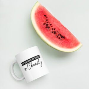 the victory of truth is charity white glossy mug