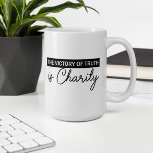 the victory of truth is charity white glossy mug